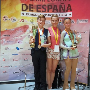 Medallistas y entrenadora