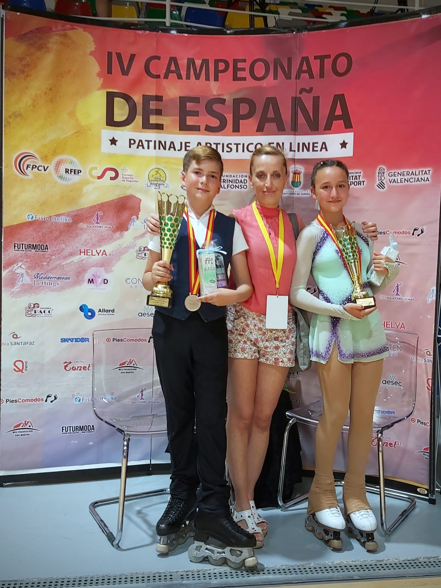 Medallistas y entrenadora